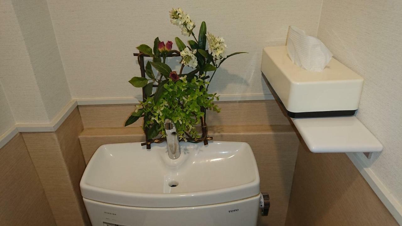 Kasuga Ryokan Hiroshima Bagian luar foto