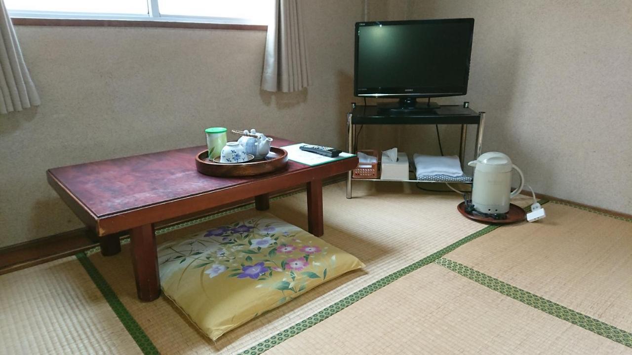 Kasuga Ryokan Hiroshima Bagian luar foto