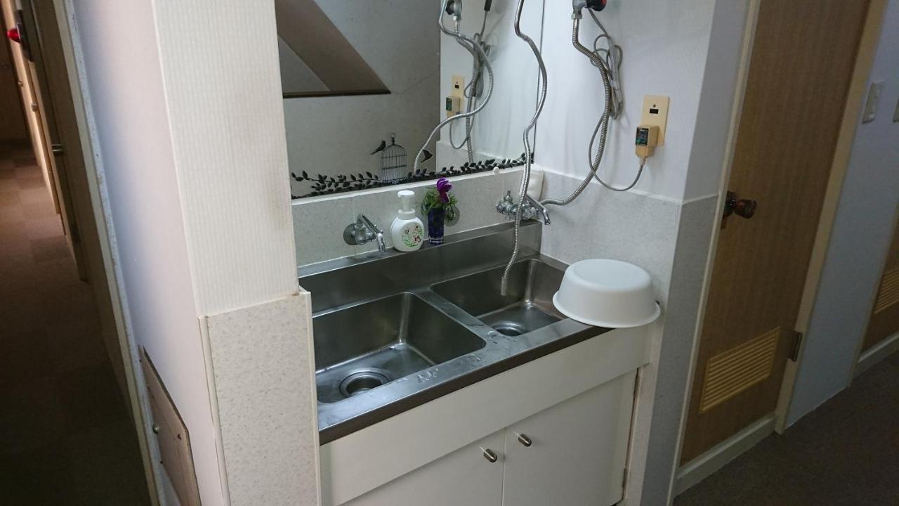 Kasuga Ryokan Hiroshima Bagian luar foto