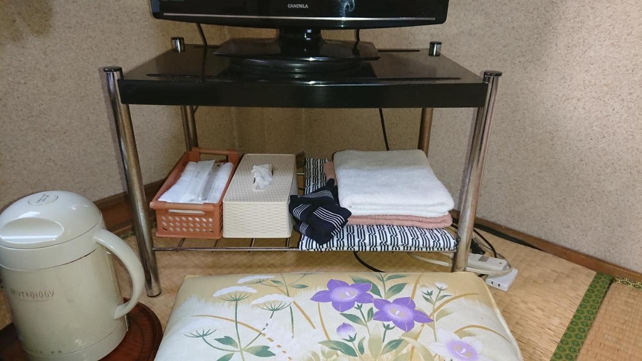 Kasuga Ryokan Hiroshima Bagian luar foto